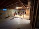 Spacious unfinished basement showing concrete floors and walls with potential for customizable layout and design at 8995 E Cornell Ave, Denver, CO 80231
