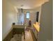 Clean bathroom with a shower, tub, and a window for ventilation and natural light at 8995 E Cornell Ave, Denver, CO 80231