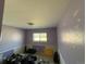 Empty room with window offers potential for customization and flexible use at 8995 E Cornell Ave, Denver, CO 80231