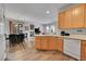 Open floor plan featuring an eat-in kitchen, dining area, and living room with fireplace at 23601 E Mississippi Cir, Aurora, CO 80018
