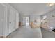 Loft with carpeted floors, wooden railings, and neutral walls at 23601 E Mississippi Cir, Aurora, CO 80018