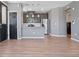 Modern kitchen with stainless steel appliances and wood cabinets at 23744 E Ida Pl # E, Aurora, CO 80016
