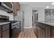 Kitchen area showing stainless steel appliances and modern design at 23744 E Ida Pl # E, Aurora, CO 80016