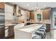 Modern kitchen showcasing stainless steel appliances, sleek countertops, and contemporary lighting at 445 Forest St, Denver, CO 80220