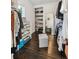 Walk-in closet featuring hardwood floors, built-in shelving, and ample storage at 445 Forest St, Denver, CO 80220