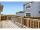 Outdoor patio deck area with scenic views and wooden fence at 15228 Detroit St, Thornton, CO 80602