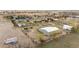 Aerial view of property with barn, featuring expansive grounds perfect for rural living and outdoor activities at 23753 E 155Th Way, Brighton, CO 80603