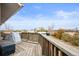 Wooden deck with view to landscape, storage containers and hot tub at 23753 E 155Th Way, Brighton, CO 80603