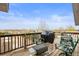 Outdoor deck with seating and grill, perfect for entertaining at 23753 E 155Th Way, Brighton, CO 80603