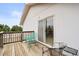 Wooden deck with patio furniture with slider to inside the home at 23753 E 155Th Way, Brighton, CO 80603