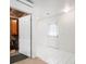 Unfinished basement room with tiled floors, closet, and white door at 23753 E 155Th Way, Brighton, CO 80603
