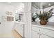 Bathroom featuring white cabinets, framed mirrors and neutral decor at 23753 E 155Th Way, Brighton, CO 80603