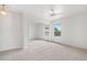 Bright bedroom features a ceiling fan and a mirrored closet at 23753 E 155Th Way, Brighton, CO 80603