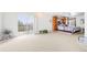 Large bedroom with sliding glass door to a balcony and neutral carpet at 23753 E 155Th Way, Brighton, CO 80603