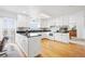 Updated kitchen with white cabinets, granite countertops and stainless appliances at 23753 E 155Th Way, Brighton, CO 80603