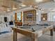 Spacious game room with a pool table, stylish lighting, and a comfortable seating area at 3701 Arapahoe Ave # 304, Boulder, CO 80303
