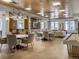 Expansive lounge featuring a bar, game tables, and multiple seating arrangements at 3701 Arapahoe Ave # 304, Boulder, CO 80303