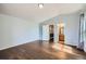 Bedroom with hardwood floors, light blue walls, and vaulted ceilings at 5624 Killdeer St, Brighton, CO 80601