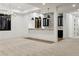 Finished basement boasts custom bar with accent wall and recessed lighting at 2511 S Columbine St, Denver, CO 80210