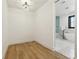 Bathroom view showing marble tile, shower, and soaking tub at 2511 S Columbine St, Denver, CO 80210