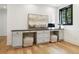 Spacious home office featuring built-in desk, plenty of storage and natural light at 2511 S Columbine St, Denver, CO 80210