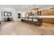 Open kitchen featuring a large island, modern lighting, and an adjacent dining area, ideal for Gathering meals at 2511 S Columbine St, Denver, CO 80210