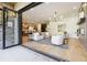 Bright and airy living room featuring an open floor plan, stylish furniture, and a seamless flow to the kitchen at 2511 S Columbine St, Denver, CO 80210