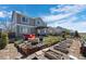 Relax in this backyard featuring a fire pit, outdoor seating, and a garden at 11671 Elkhart, Brighton, CO 80603