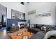Inviting living room with a fireplace, stylish decor, and comfortable seating, perfect for relaxation at 11671 Elkhart, Brighton, CO 80603