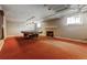 Spacious basement featuring a pool table and fireplace, perfect for entertaining at 2222 E 7Th Avenue Pkwy, Denver, CO 80206