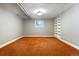 Finished basement space with carpet, shelving, and a window at 2222 E 7Th Avenue Pkwy, Denver, CO 80206