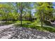 Classic brick home with mature trees and a spacious front lawn, prime location at 2222 E 7Th Avenue Pkwy, Denver, CO 80206