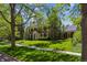 Traditional brick home with well-maintained lawn and mature landscaping at 2222 E 7Th Avenue Pkwy, Denver, CO 80206