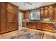 Gourmet kitchen featuring granite countertops, custom cabinets, stainless steel appliances, and natural light at 2222 E 7Th Avenue Pkwy, Denver, CO 80206