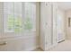 Bright room featuring white trim, built-ins, and a window that lets in plenty of natural light at 2222 E 7Th Avenue Pkwy, Denver, CO 80206