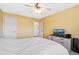 Bedroom featuring neutral colors and access to the ensuite bathroom at 8389 Owl Roost Ct, Parker, CO 80134