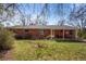 Expansive backyard showing brick exterior, patio, and manicured lawn at 2165 S Nucla Way, Aurora, CO 80013