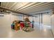 Spacious basement offers versatile storage options and painted concrete floors at 2165 S Nucla Way, Aurora, CO 80013