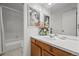 Inviting bathroom features tile-surround tub, ample counter space, and neutral color palette at 2165 S Nucla Way, Aurora, CO 80013