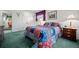 Charming bedroom with cozy furnishings, plush carpet, and decorative wall sconces at 2165 S Nucla Way, Aurora, CO 80013