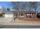 Charming single-story home with a brick facade, attached garage, and a well-maintained front yard at 2165 S Nucla Way, Aurora, CO 80013