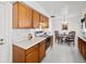 Updated kitchen features modern appliances, ample counter space, and a breakfast nook for relaxed dining at 2165 S Nucla Way, Aurora, CO 80013