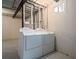 Convenient laundry room features modern washer and dryer units at 2165 S Nucla Way, Aurora, CO 80013