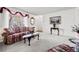 Spacious living room with neutral carpet, large windows, and classic decor for a welcoming atmosphere at 2165 S Nucla Way, Aurora, CO 80013