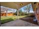 Covered patio on a well maintained lawn, perfect for outdoor seating at 2165 S Nucla Way, Aurora, CO 80013