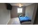Bedroom features ceiling fan and a window at 4543 Cathay St, Denver, CO 80249