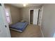 Carpeted bedroom featuring window and closet at 4543 Cathay St, Denver, CO 80249