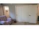 Bedroom with a chair and view of a closet at 4543 Cathay St, Denver, CO 80249