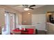 Bright dining area with a ceiling fan, sliding glass doors, and a view of the backyard at 4543 Cathay St, Denver, CO 80249