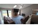 Spacious living room with a fireplace, skylights, and sliding glass doors to the backyard at 4543 Cathay St, Denver, CO 80249